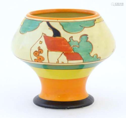 A Clarice Cliff pedestal bowl in the Red Roofs pattern, deco...