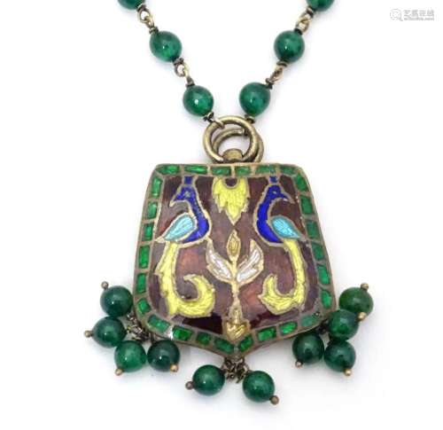An Art Nouveau pendant necklace with enamel decoration and g...