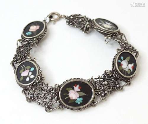 A silver bracelet set with 5 oval panel with pietra dura sty...