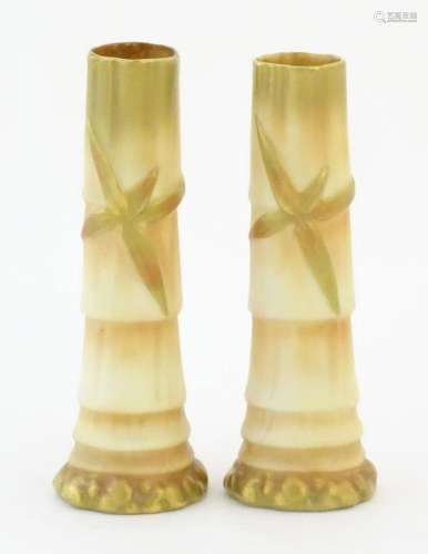 A pair of Royal Worcester spill vases with relief bamboo det...