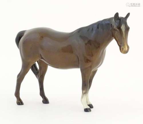 A Beswick model of a brown horse. Model no. 701. Marked unde...