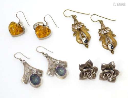 Four various pair of earrings to include some silver example...