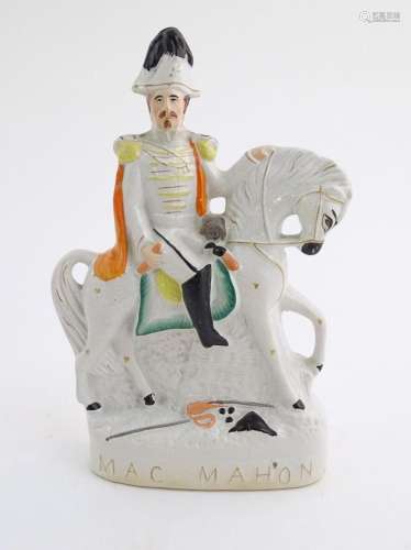 A 19thC Staffordshire pottery equestrian figure depicting Ma...