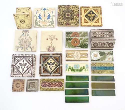 A quantity of assorted ceramic tiles with floral and foliate...