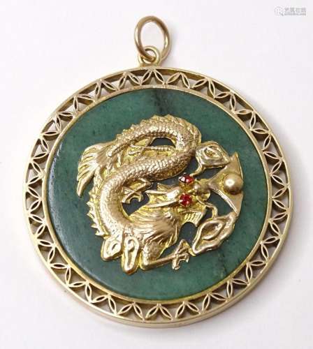 A 14ct gold pendant set with and jade roundel decorated with...