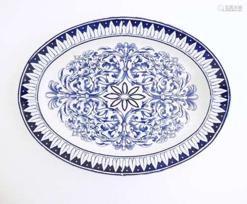 A blue and white meat plate in the pattern Teutonic by Brown...