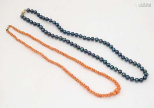 A necklace of graduated coral beads, with 9ct gold clasp app...