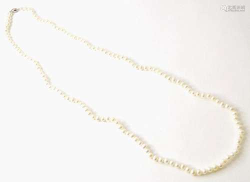 A pearl necklace approx 30" long