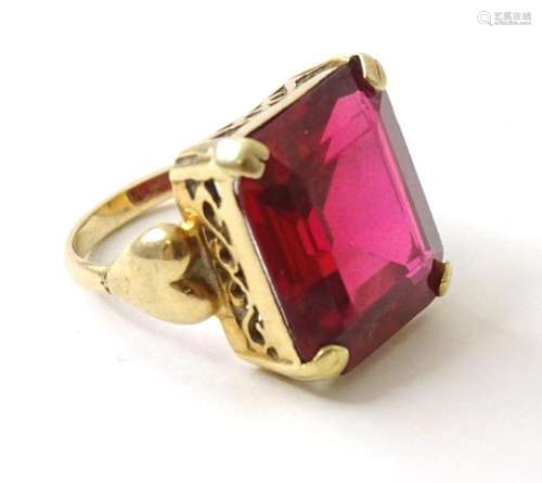 A 9ct gold ring set with a ruby. Ring size J