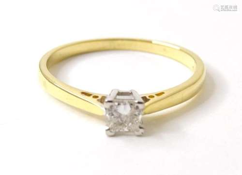 An 18ct gold diamond solitaire ring, the diamond approx. .33...