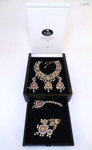 A suite of Asian wedding / bridal jewellery comprising neckl...
