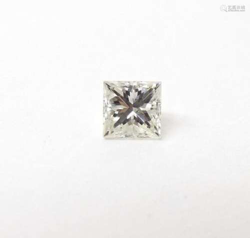 A square cut diamond, unmounted. Approx. 1/8" wide