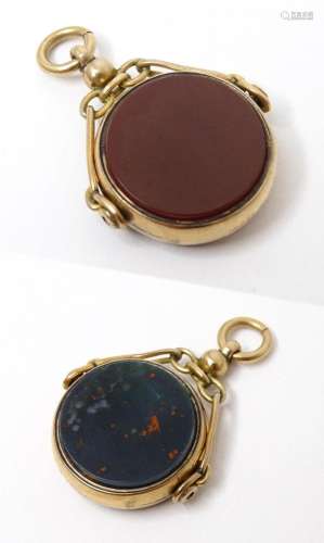 A Victorian 9ct gold pendant fob set with central rotating s...