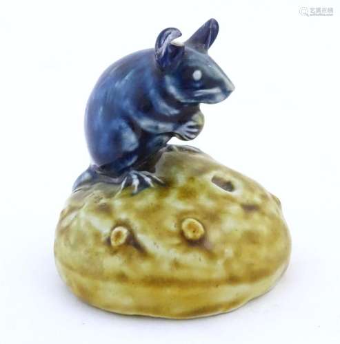 A Doulton Lambeth George Tinworth model of a mouse on a curr...