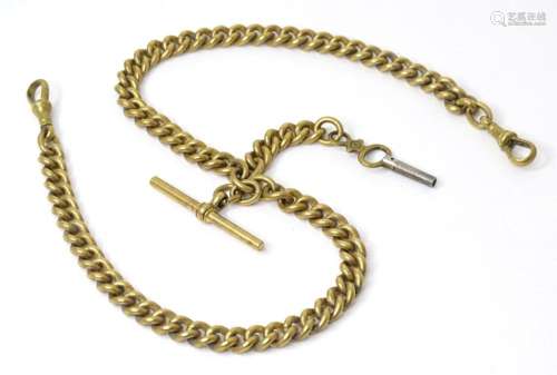 A gilt metal Albert pocket watch chain with pocket watch key...