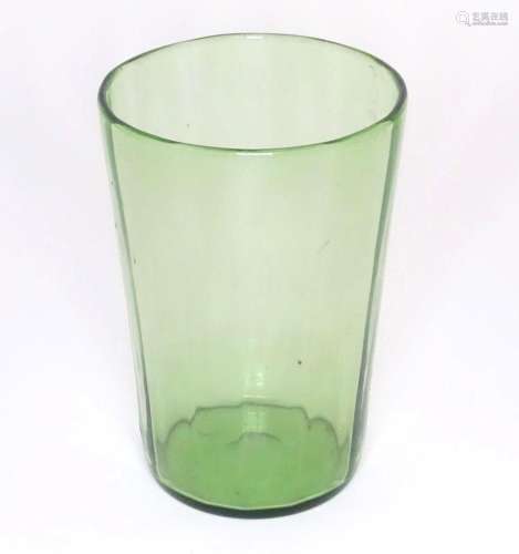 A green glass vase of tapering form 8" high