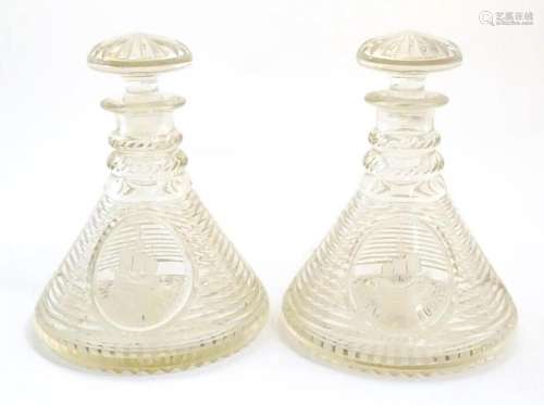 A pair of glass ship s decanters with step cut decoration an...