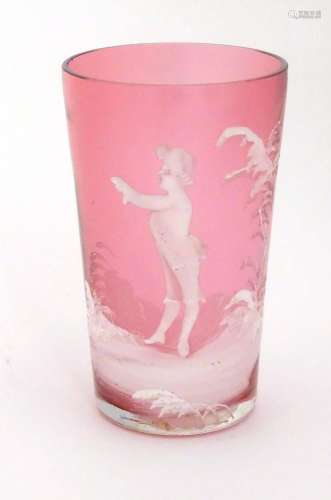 A Cranberry glass beaker with Mary Gregory style white ename...