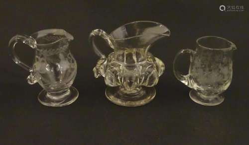 Three various 19thC and later cream jugs. The tallest 4"...
