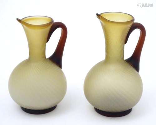 A pair of mid century retro brown and cream glass jugs / sma...