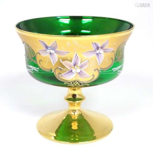 A Bohemian green glass pedestal bowl with gilt and enamel fl...