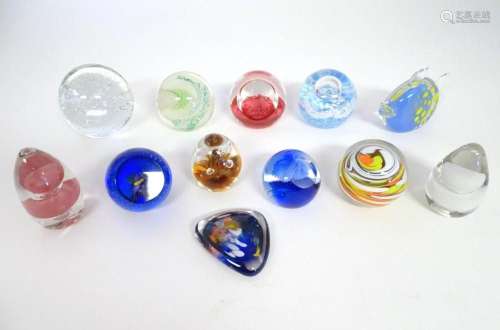 Assorted glass paperweights to include examples by Wedgwood,...