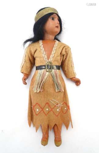 Toy: A 20thC Continental doll modelled as a Red Indian woman...