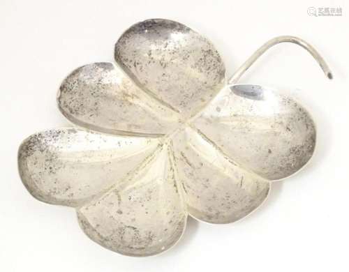 A Victorian silver pin dish of stylised leaf form hallmarked...