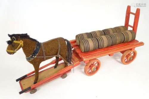 Toy: An early 20thC toy horse and cart / dray with eight bar...
