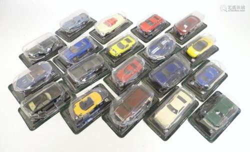 Toys: A quantity of boxed die cast scale model car vehicles,...
