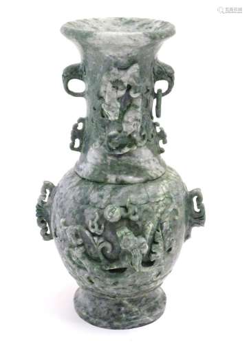 An Oriental jade coloured soapstone vase of three sectional ...