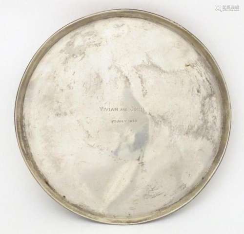 A Victorian silver salver / tray of circular form standing o...