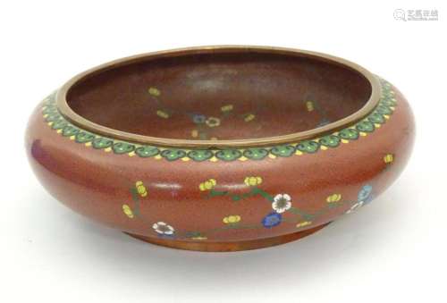 A Chinese cloisonne shallow bowl with floral and foliate det...