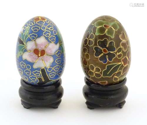 Two small Oriental cloisonne eggs with floral and foliate de...