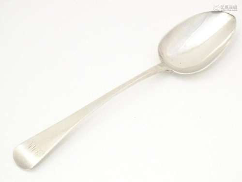 A Geo III silver Old English pattern table spoon, hallmarked...