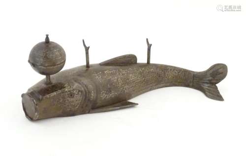 An Oriental cast metal novelty standish modelled as a fish w...