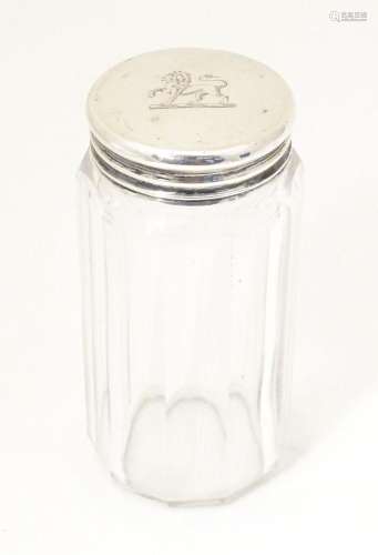 A Victorian glass dressing table jar with silver screw top h...
