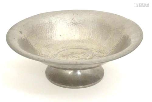 An Arts and Crafts Tudric Pewter pedestal bowl with hammered...