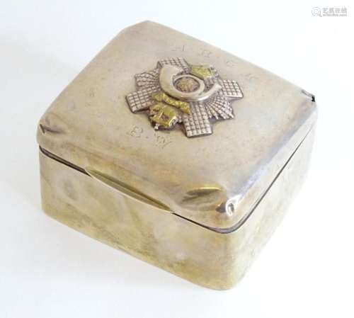 Military interest: A silver table top cigarette box with ins...