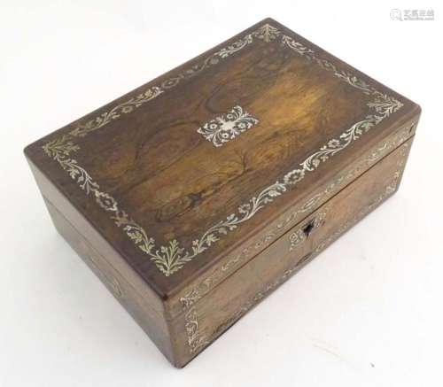 A Victorian rosewood writing slope with inlaid floral and fo...
