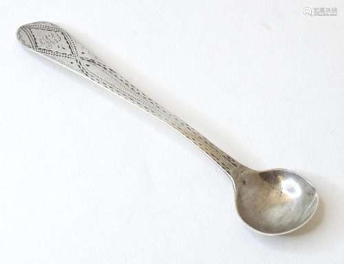 A Geo III silver salt spoon with bright cut decoration hallm...
