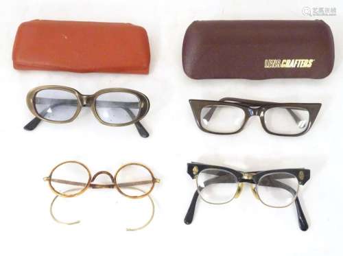 Four pairs of mid 20thC spectacles / glasses, the largest 5 ...
