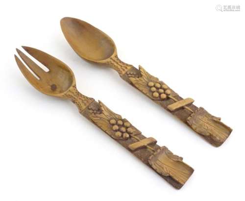 A pair of Continental carved wooden serving spoons / salad s...
