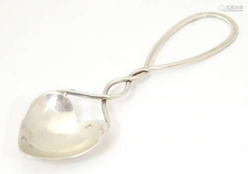 An Elizabeth II Scottish silver spoon with heart shaped bowl...