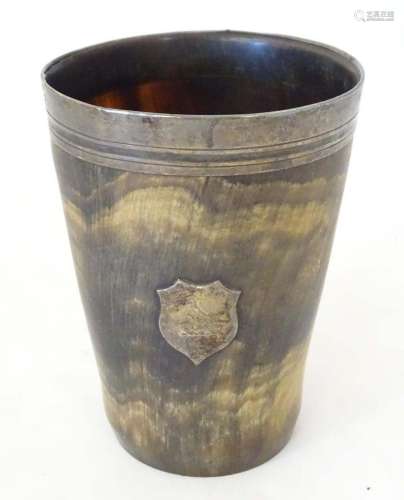 A Victorian horn beaker of tapering form with silver mount h...