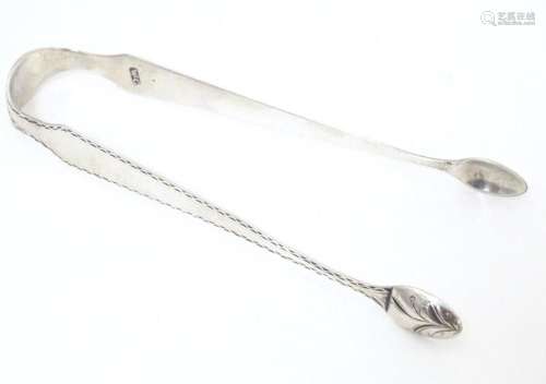 19thC silver sugar tongs with bright cut decoration, maker W...