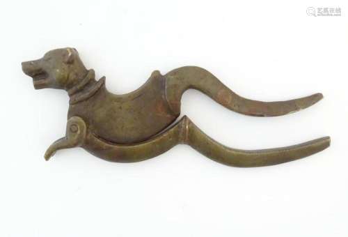 A 19thC cast bronze betel nut cracker / cutter modelled as a...