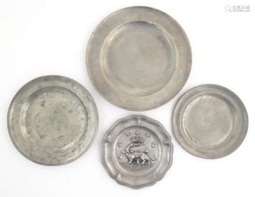 Four assorted pewter plates, comprising a 20thC Les Etains d...