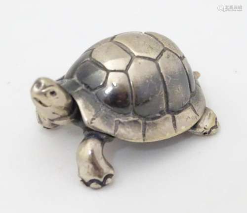 A Continental white metal model of a tortoise. Approx. 1 1/2...