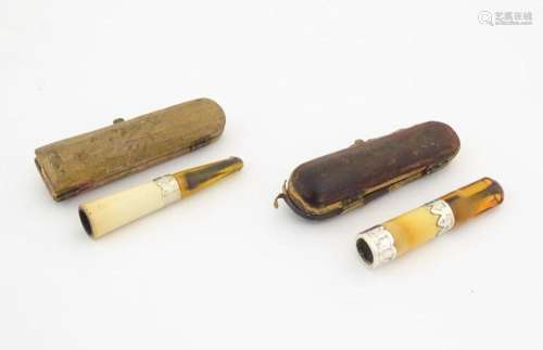 Two cased cheroot mouthpieces, with amber stems and meerscha...